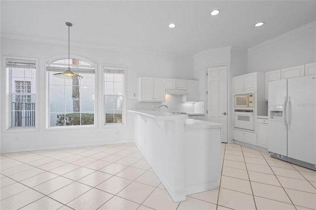 kitchen featuring white cabinetry, decorative light fixtures, light tile patterned floors, ornamental molding, and white appliances