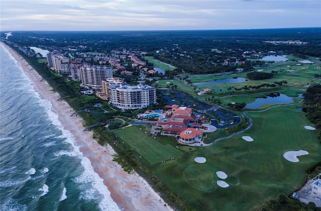 aerial view featuring a water view and a view of the beach