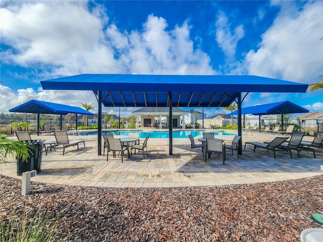 view of patio / terrace featuring a community pool