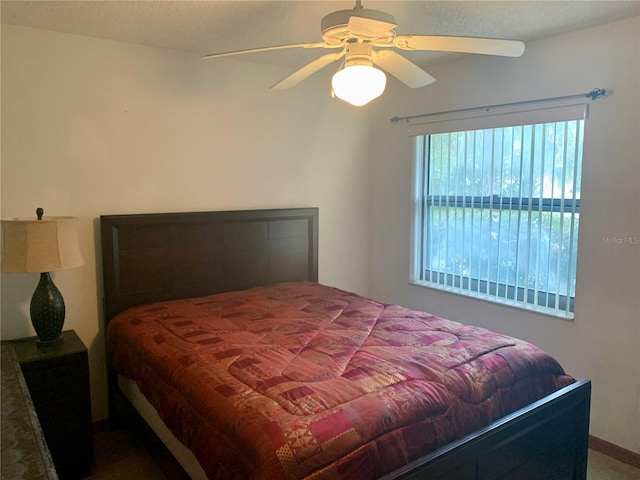 bedroom featuring ceiling fan