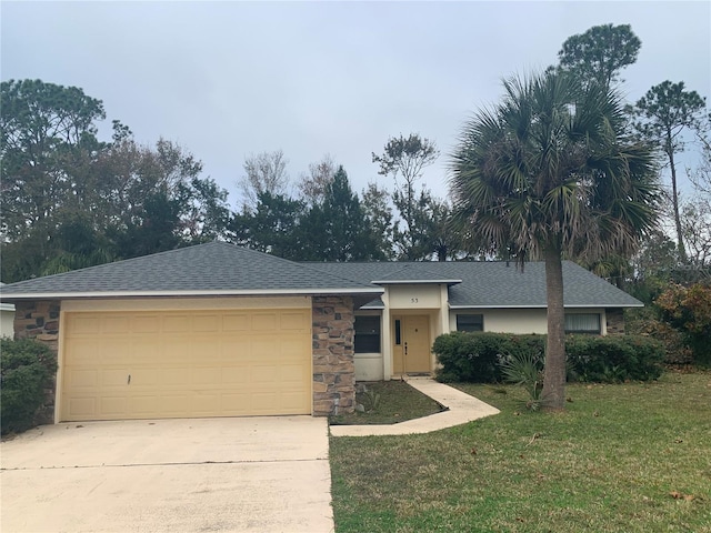 ranch-style home with a garage and a front yard