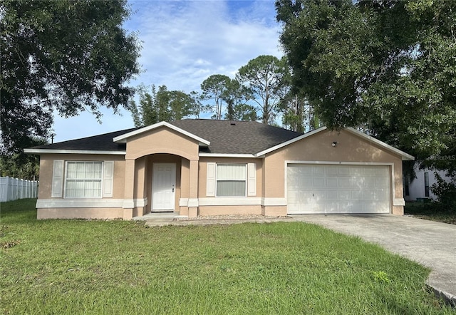 ranch-style home with a front yard and a garage