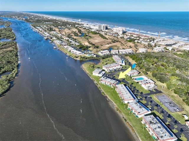 bird's eye view with a water view