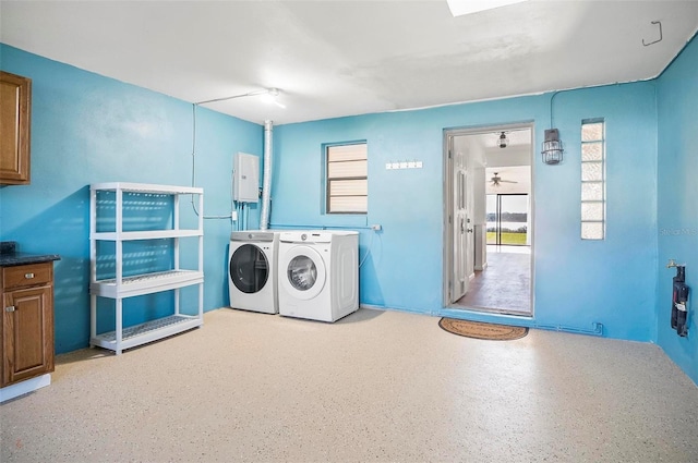 clothes washing area featuring washing machine and clothes dryer