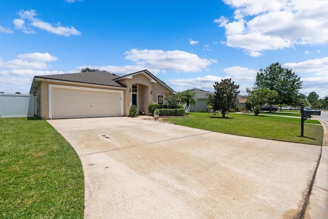 single story home featuring a garage and a front yard