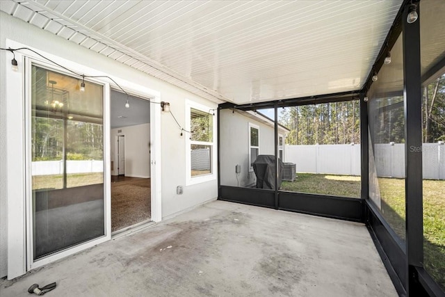 unfurnished sunroom with a healthy amount of sunlight