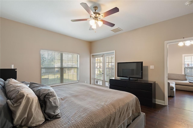 bedroom with access to exterior, ceiling fan, and dark wood-type flooring