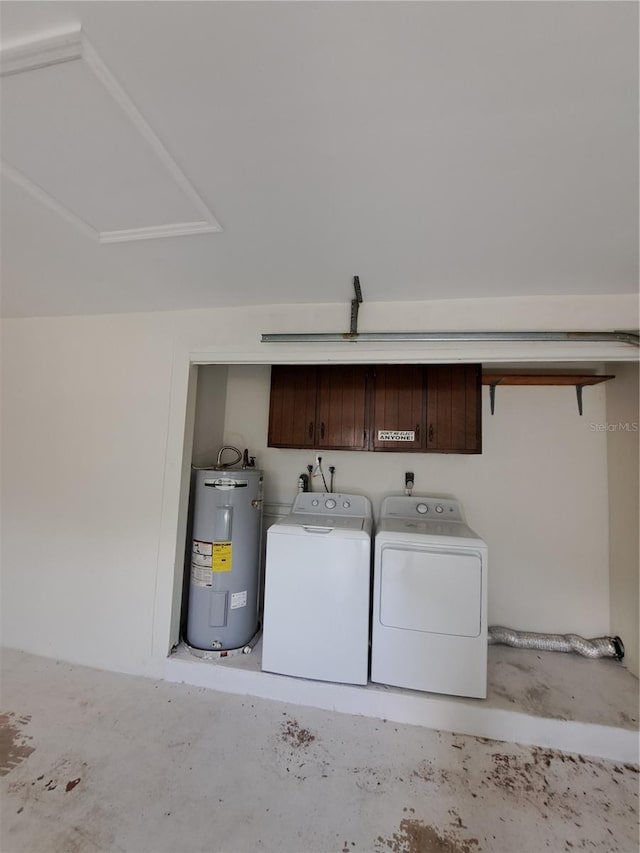 laundry room with cabinets, separate washer and dryer, and water heater