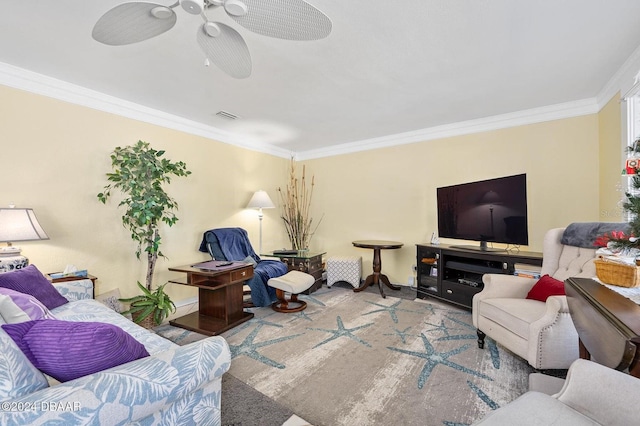 living room with ceiling fan and ornamental molding