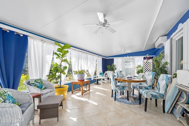 sunroom featuring vaulted ceiling, an AC wall unit, and ceiling fan