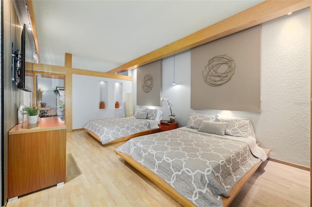 bedroom with light hardwood / wood-style flooring