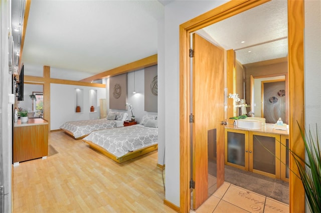 bedroom featuring light wood-type flooring