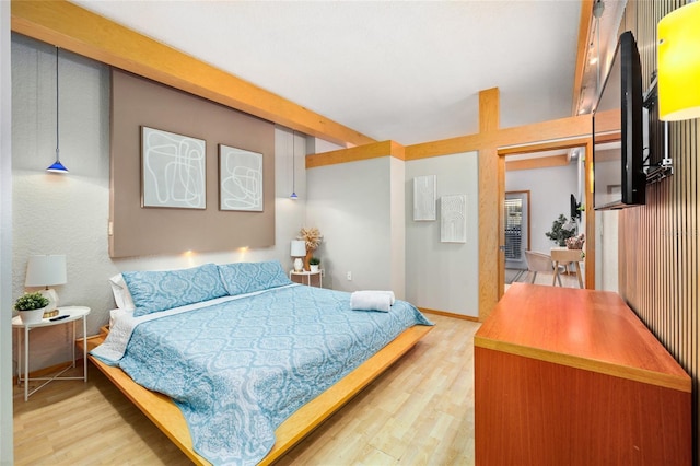 bedroom featuring hardwood / wood-style floors