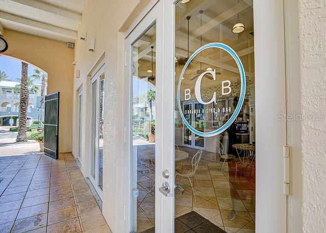 entryway featuring french doors and beamed ceiling