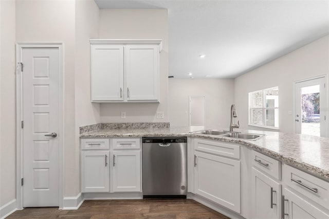 kitchen with white cabinetry, stainless steel dishwasher, and sink