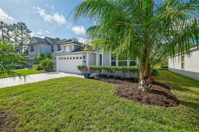 view of front of house with a garage and a front lawn