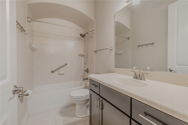 full bathroom featuring tile patterned flooring, vanity, toilet, and shower / bath combination