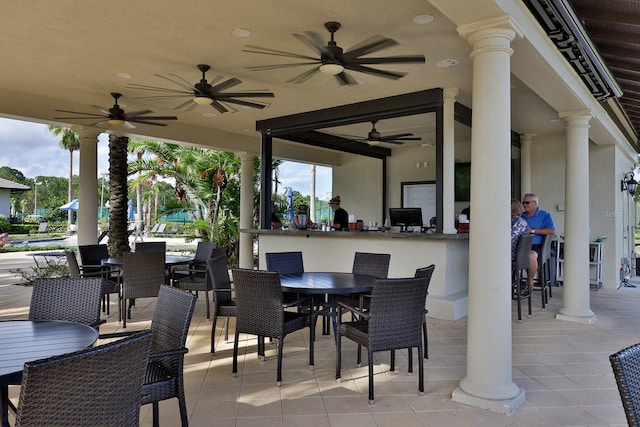 view of patio featuring exterior bar