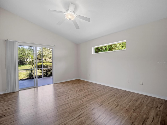 unfurnished room featuring ceiling fan, hardwood / wood-style floors, and high vaulted ceiling