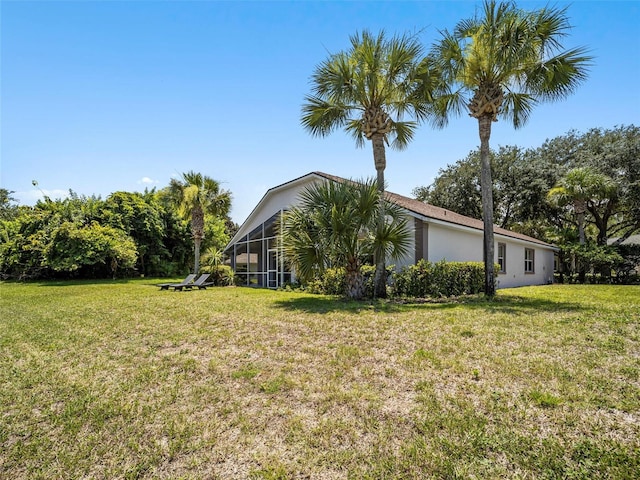 view of property exterior featuring a lawn