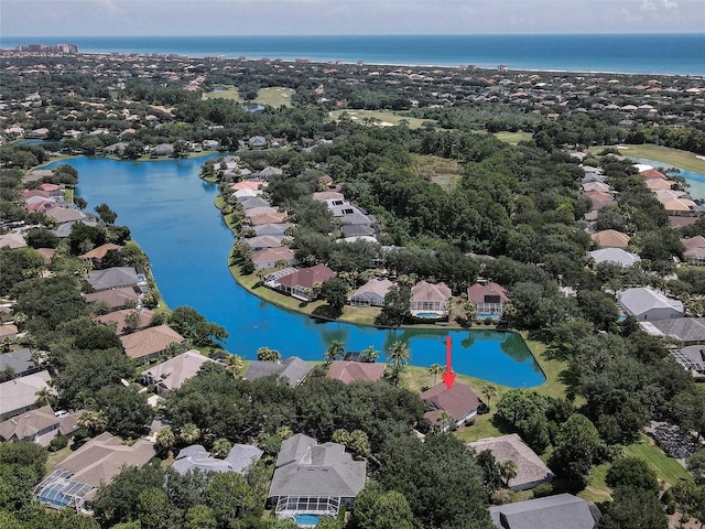 drone / aerial view featuring a water view