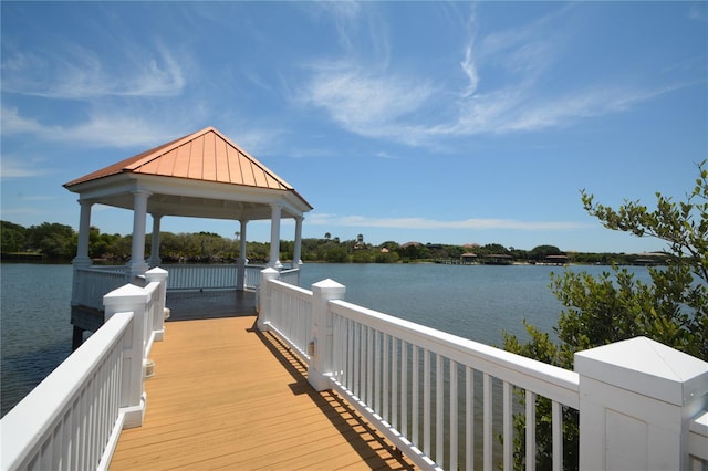 dock area featuring a gazebo and a water view