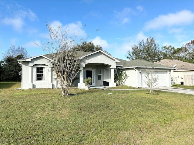 single story home featuring a front yard and a garage