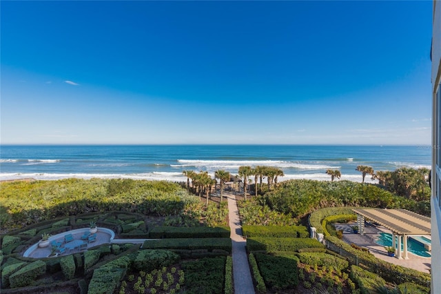 view of water feature with a beach view