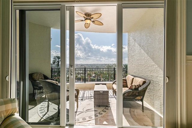 balcony featuring ceiling fan