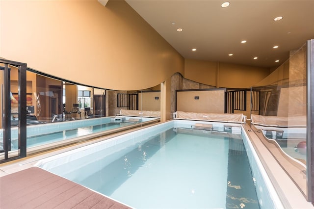 view of pool featuring a hot tub