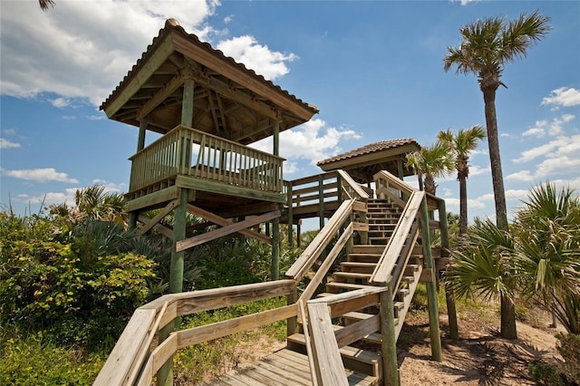 view of jungle gym featuring a wooden deck