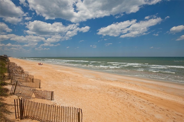 view of water feature featuring a beach view