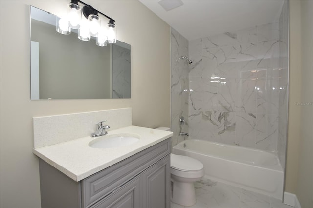 full bathroom with tiled shower / bath combo, vanity, and toilet