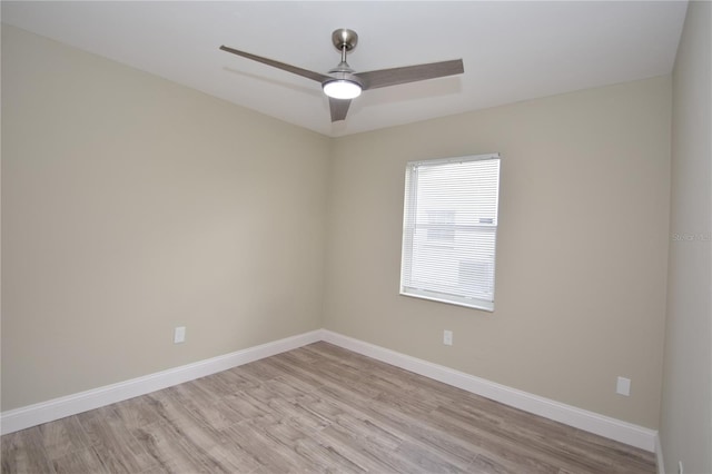 spare room with ceiling fan and light hardwood / wood-style flooring