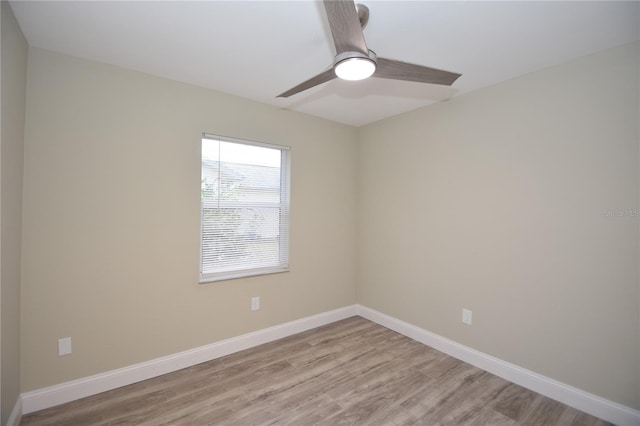 unfurnished room with ceiling fan and light hardwood / wood-style floors