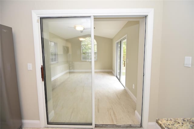 interior space featuring lofted ceiling