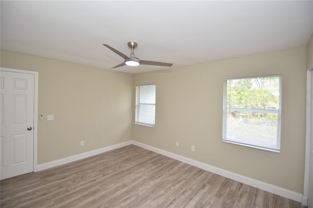 unfurnished room featuring ceiling fan and light hardwood / wood-style floors