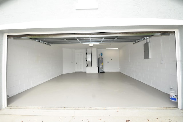 garage with electric panel, a garage door opener, water heater, and heating unit