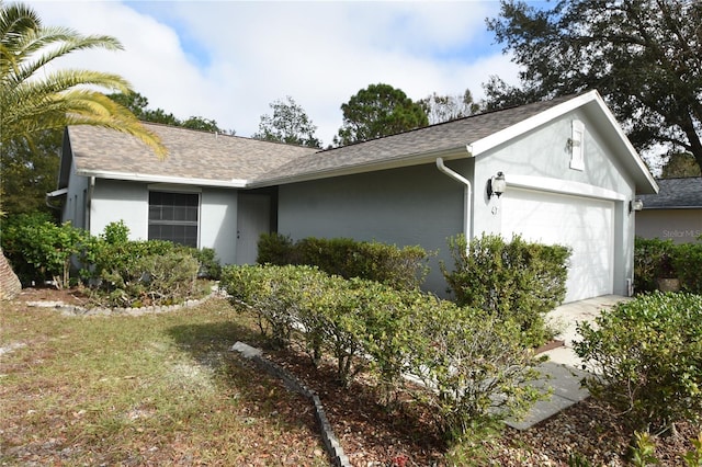 single story home with a garage