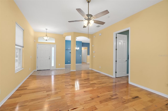 entrance foyer with light wood-type flooring and ceiling fan