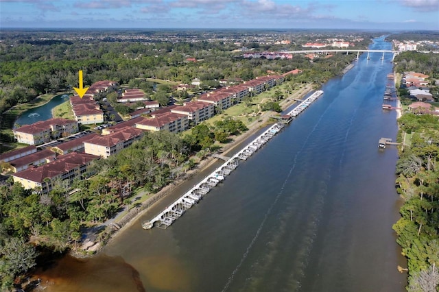 birds eye view of property featuring a water view