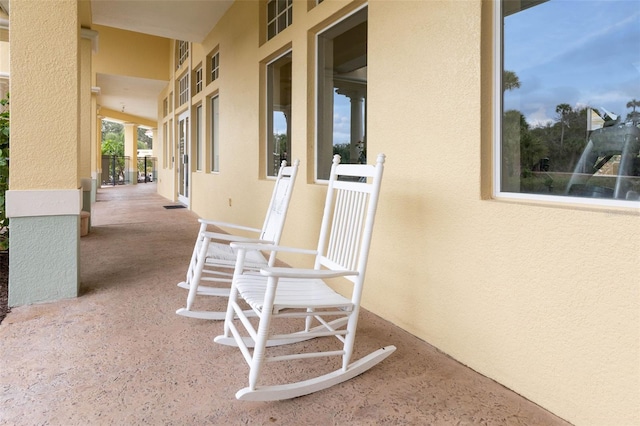 view of patio featuring a porch