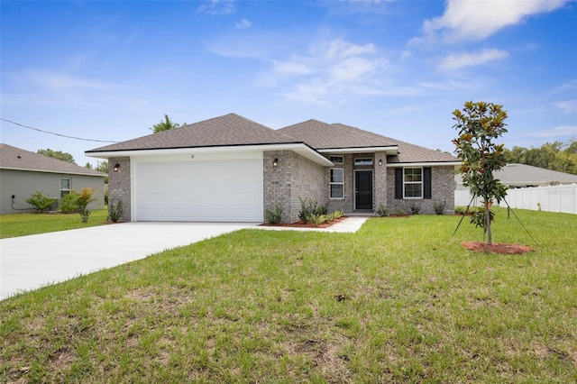 10 Zinc Pl, Palm Coast, FL 32164 - view of front of house with an attached garage, concrete driveway, and brick siding