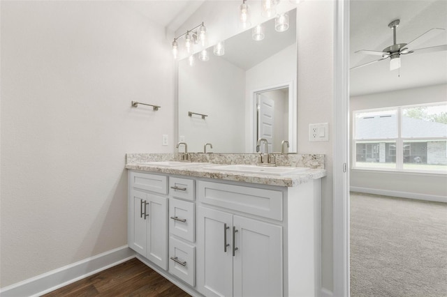 10 Zinc Pl, Palm Coast, FL 32164 - full bathroom featuring baseboards, double vanity, and a ceiling fan