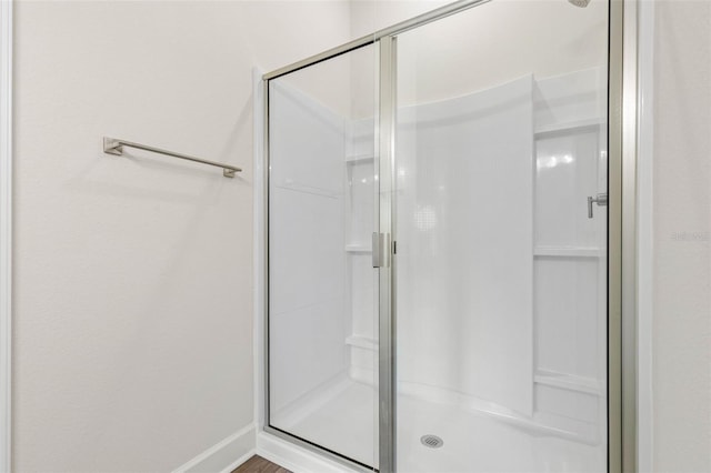 10 Zinc Pl, Palm Coast, FL 32164 - bathroom featuring a stall shower and baseboards