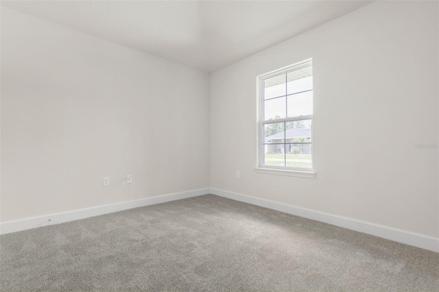 10 Zinc Pl, Palm Coast, FL 32164 - unfurnished room featuring carpet flooring and baseboards