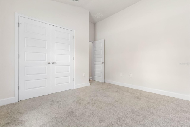 10 Zinc Pl, Palm Coast, FL 32164 - unfurnished bedroom with carpet, a closet, and baseboards