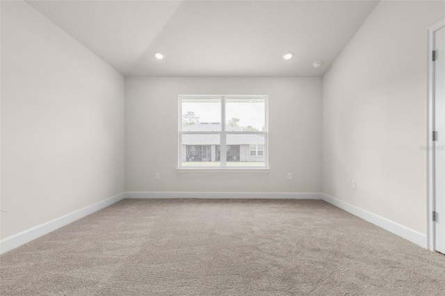 10 Zinc Pl, Palm Coast, FL 32164 - spare room featuring carpet flooring, recessed lighting, and baseboards