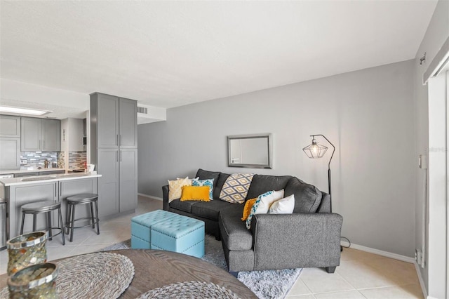 living room featuring light tile patterned flooring