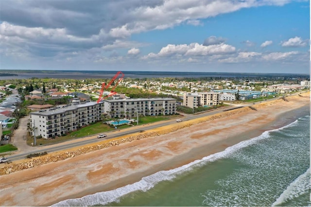 aerial view with a beach view and a water view